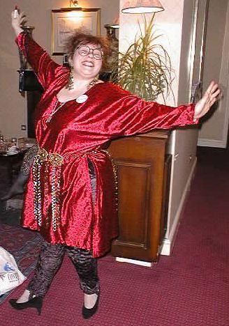 Sue Mason in a red sparkly dress